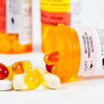 pill contains full of pills that are spilled over